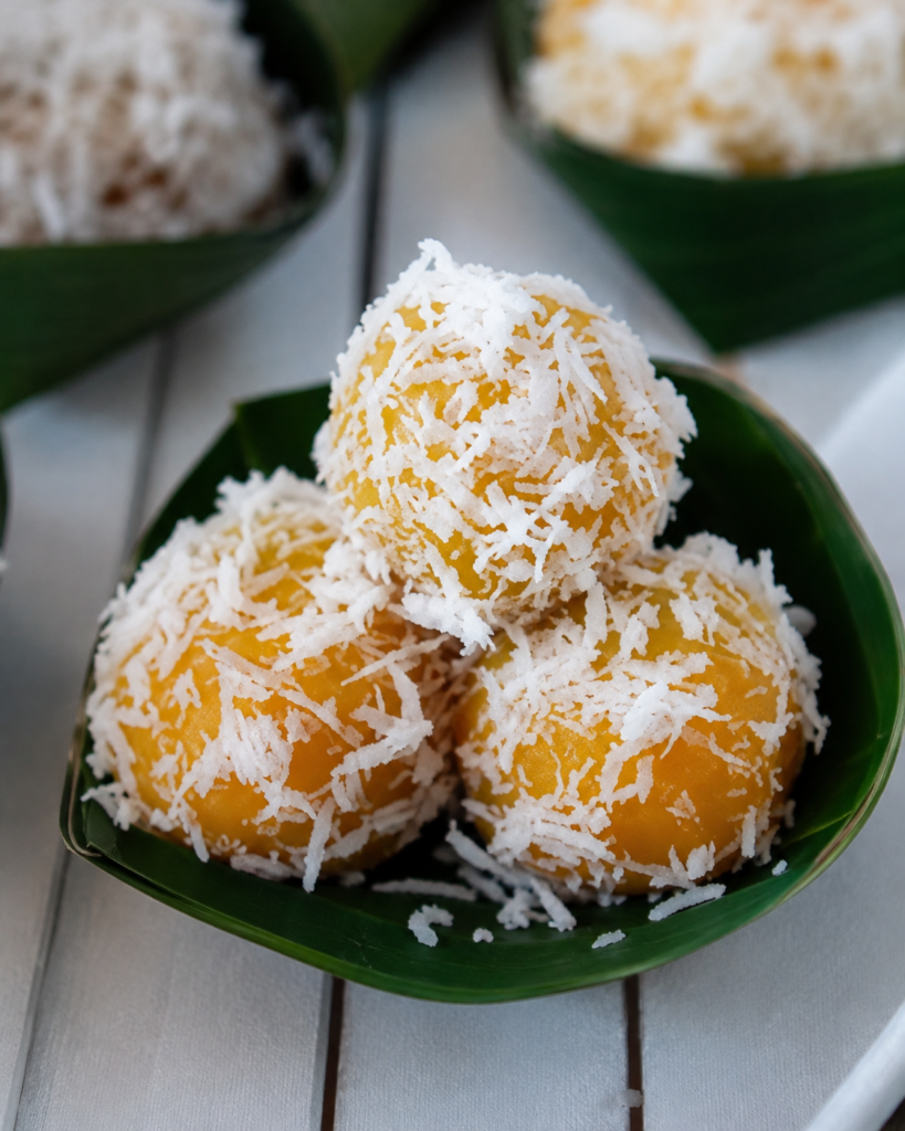 Eurimoo, traditional Papuan sago and banana cakes coated with grated coconut