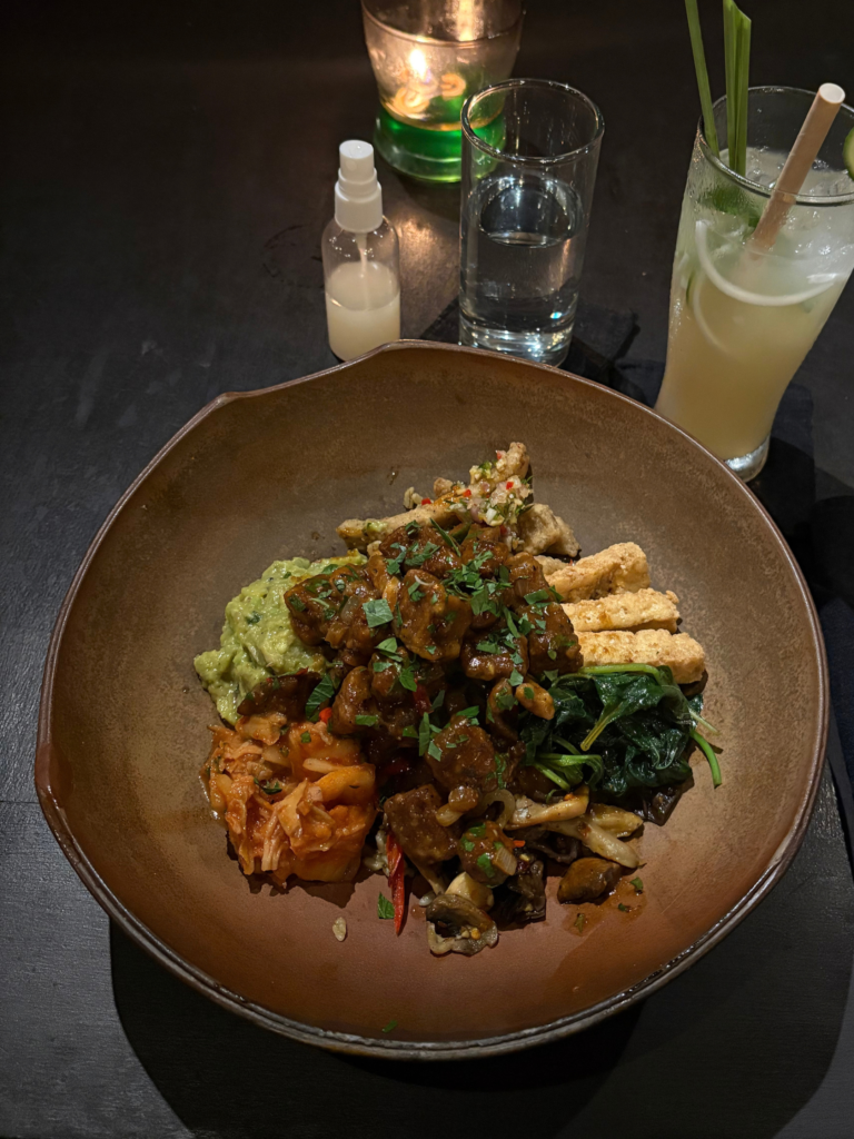 Vegetarian food in Indonesia. Meal with tempeh, vegetables and rice