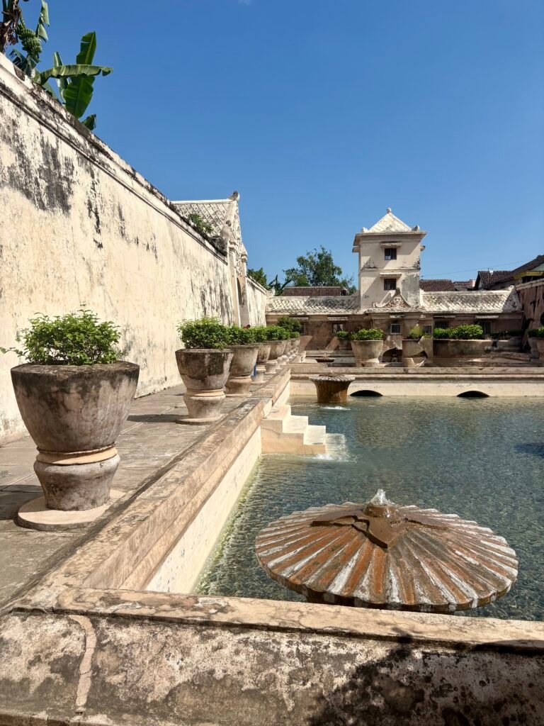 Taman Sari’s bathing pool and stone fountains, featured in our One Week in Yogyakarta itinerary.
